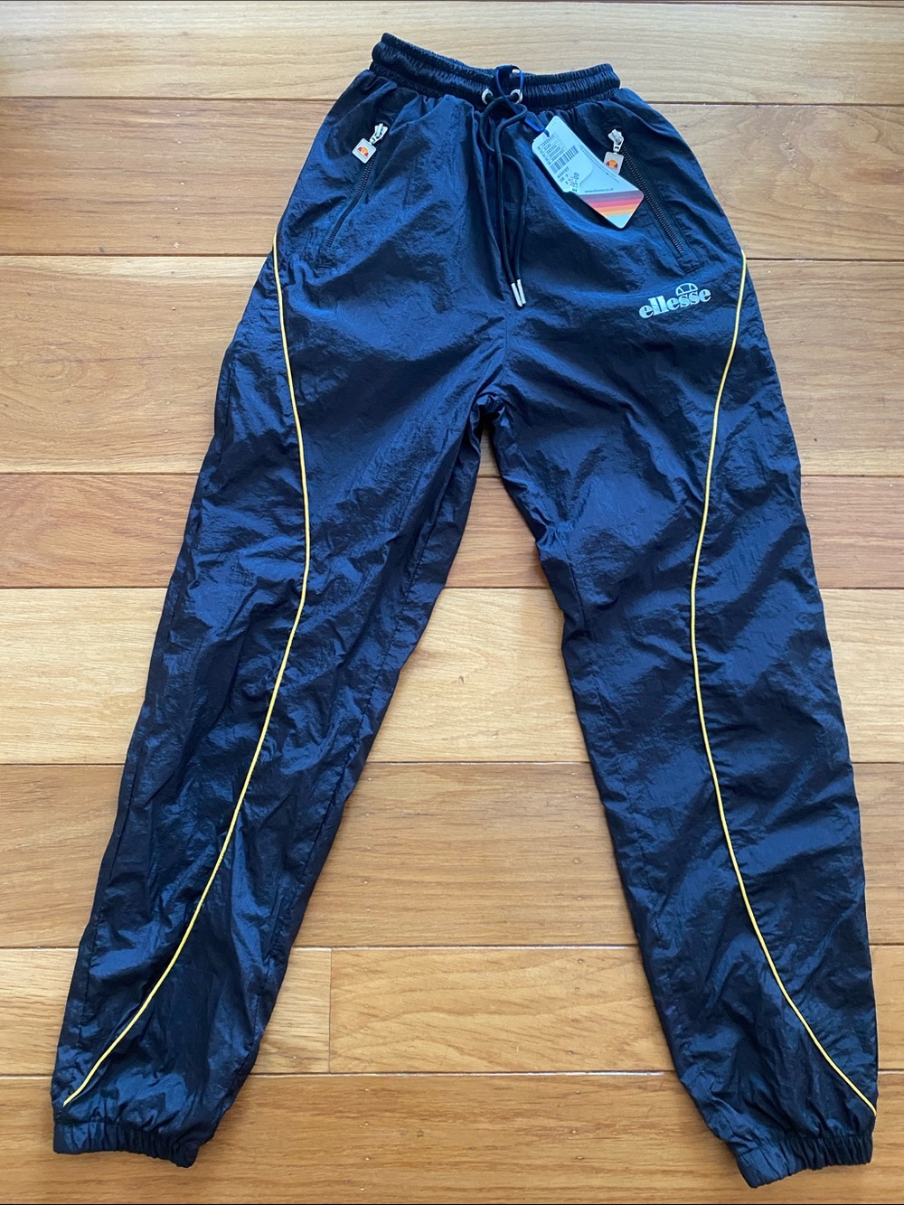 Ellesse Black Track Pants with Yellow Piping and Logo